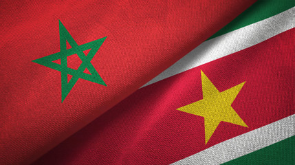 Morocco and Suriname two flags textile cloth, fabric texture