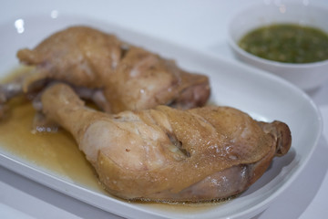  boiled chicken leg in fish sauce brown soup