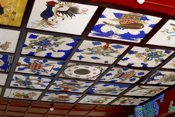 Decorated ceiling of a temple in the Chinese gardens of the Black Dragon Pool in Jade Spring Park, Lijiang, Yunnan, China
