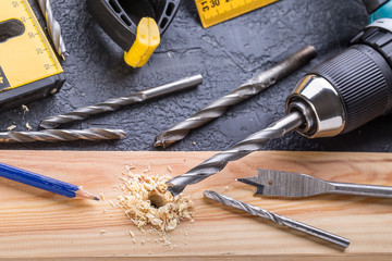 Working Tool on a Wooden Background. Set of tools