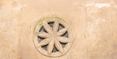 Small Good Luck Charms in a Wall in The Ancient City of Matera, Italy
