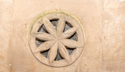Small Good Luck Charms in a Wall in The Ancient City of Matera, Italy