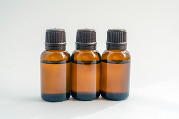 brown bottles with liquid