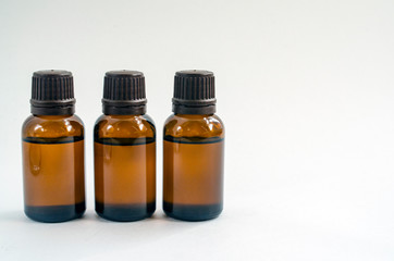 brown bottles with liquid