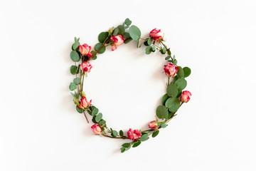 Wreath made of eucalyptus branches and pink roses