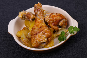 Roasted chicken legs with potato