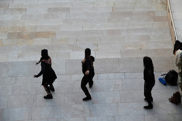 Three dancers performing