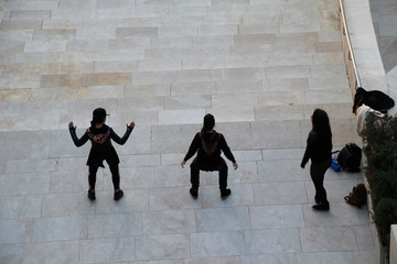 Three dancers performing