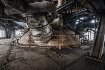 Keuken spatwand met foto scene and details of an abandoned steel furnace building © Bob