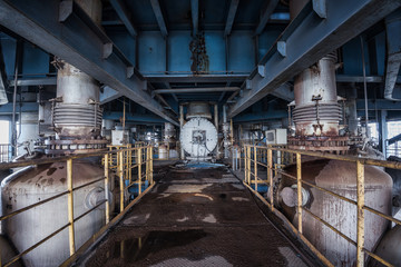 Naklejka na ściany i meble scene and details of an abandoned steel furnace building