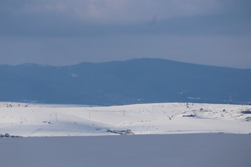Mountain winter landscape of snowed forest