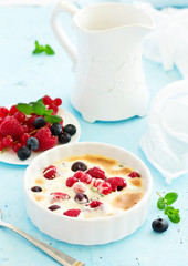 Zabaglione with champagne and berries. French dessert.