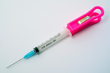 Fototapeta premium medical syringe on white background