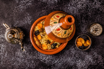 Traditional moroccan tajine of chicken with dried fruits and spices.