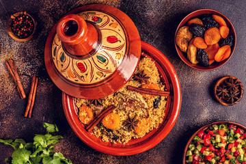 Traditional moroccan tajine of chicken with dried fruits and spices.