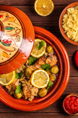 Traditional moroccan tajine of chicken with salted lemons, olives