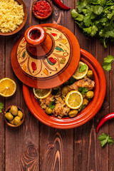 Traditional moroccan tajine of chicken with salted lemons, olives