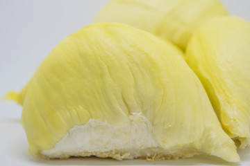 Ripe durian fruit on a white background.