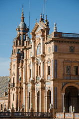 Fototapeta na wymiar Central building in the Spain Square (Plaza de España), in Seville, a landmark example of the Regionalism Architecture, mixing elements of the Renaissance Revival and Moorish Revival styles of Spanish