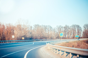 view from salon of car going on the road