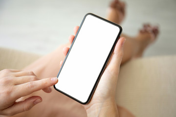  female hands holding phone with isolated screen