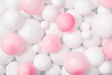 White and pink balloons pattern. Party or birthday background. Flat lay style.