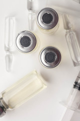 Subcutaneous syringe. Syringes with blue needles. Medical Injectors. Medical glass injection...