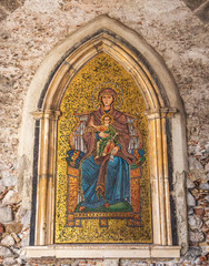 Golden Mosaic of Madonna and Child on a Wall in Sicily, Italy