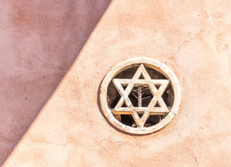 Star of David Embedded in the Wall of a Medieval Synagogue In Sicily, Italy