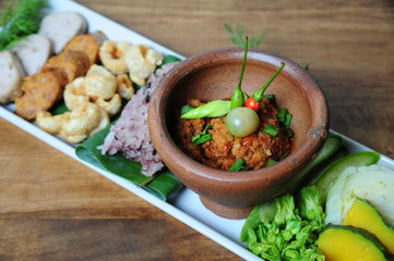 Tradition Northern Thai food. Thai cuisine nam prik or chili sauce, Thai sausages , deep fried pork skin. Thai food concept