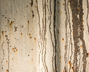 Texture of the old paint on rusty metal wall