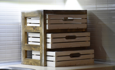 Handmade wooden crates in various colours