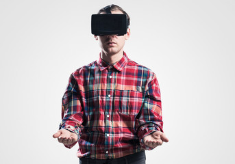 Guy in mask experiencing virtual reality as new entertainment device