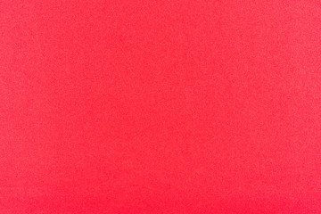 Red gradient color with texture from real foam sponge paper for background, backdrop or design.