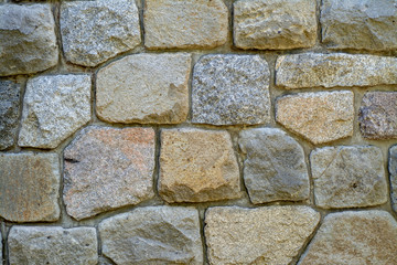 Wall of stone blocks