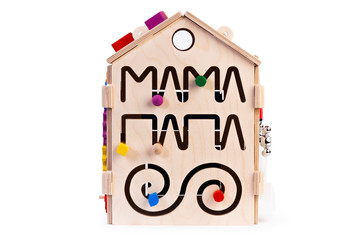 Wooden eco-friendly busy board house - educational toy for children, babies on a white isolated background, consisting of multi-colored wooden puzzle pieces, maze, gear, sorter