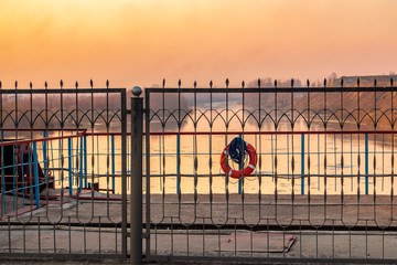 dam on the river at sunset