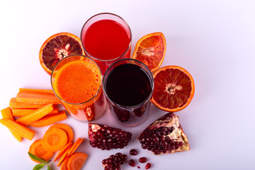 Different healthy vegan drinks on the white background. Raw drinks and foods.