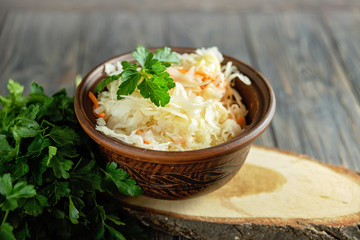 salad homemade sauerkraut in a glass jar on a table