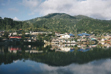 Fototapeta na wymiar Landscape of beautiful lake in the morning at Ban Rak Thai, North of Thailand