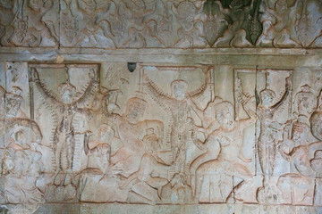 Stone Carving, all around on the wall at Angkor wat.