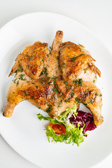 Grilled Chicken tobacco on the white plate