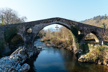 Fototapeta na wymiar Old Roman stone bridge in Cangas de Onis