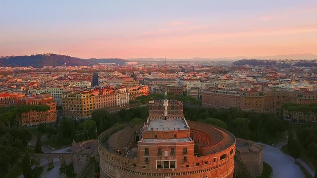 rome st angelo castle or castel sant'angelo aerial view at sunrise fly backwards