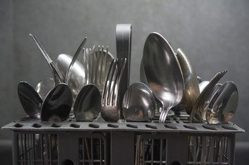 cutlery in the dishwasher basket