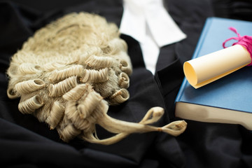 Legal Concept Still Life Of Barristers Wig With Gown And Brief