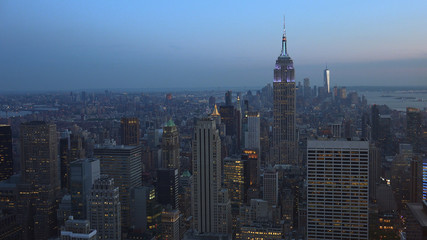 Obraz premium New York, Usa:Aerial view of Manhattan midtown and downtown skyscrapers ar sunset and dusk time