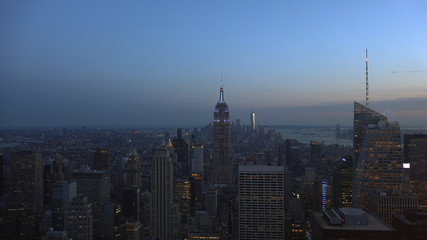 Fototapeta na wymiar New York, Usa:Aerial view of Manhattan midtown and downtown skyscrapers ar sunset and dusk time