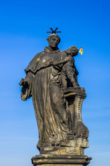 Fototapeta na wymiar Statue on Chales Bridge in Prague