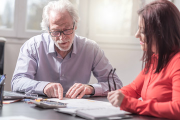 Businesspeople working in office, light effect